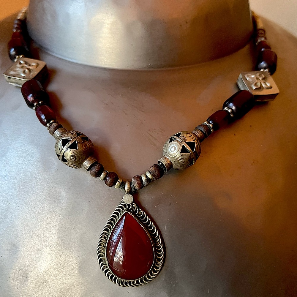 Heirloom Tibetan necklace w/ large teardrop garnet center silver & garnet beads.